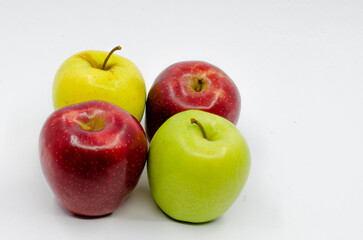 Red and Green colored Apples. Red and green apples isolated on a white background.
