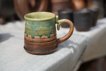 Ceramics, a ceramic product made with their own hands, made on a potter's wheel, jug, mug, clay, ornament.