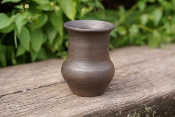 Fototapeta na wymiar Ceramics, a ceramic product made with their own hands, made on a potter's wheel, jug, mug, clay, ornament.