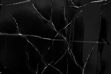 Black damaged cardboard paper overlay texture background
