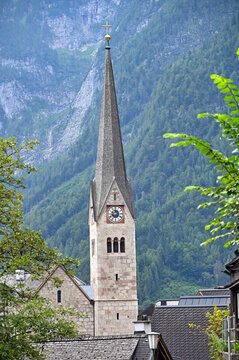 Church tower with clock in Hallstatt Austria