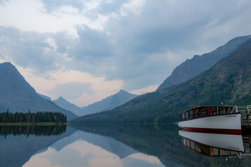 Sinopah Ferry Sits In Mirror Still Two Medicine Lake