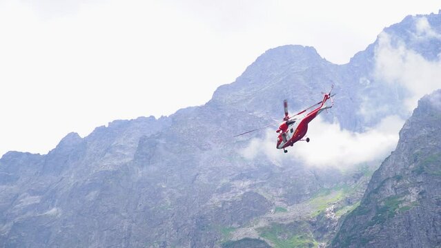 Helicopter rescue action in the mountains Tatras national park, Poland, Zakopane