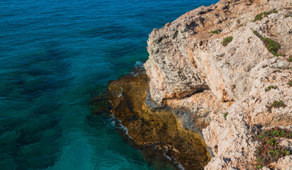 Fototapeta na wymiar Coastal rocks and lagoon of Mediterranean Sea