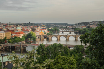 Fototapeta na wymiar Fascinating view of Prague and Charles Bridge in sunset.
