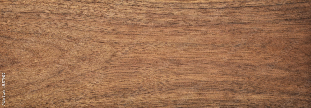 Poster dark wood texture in walnut color. empty surface rustic table background. mahogany template for desi