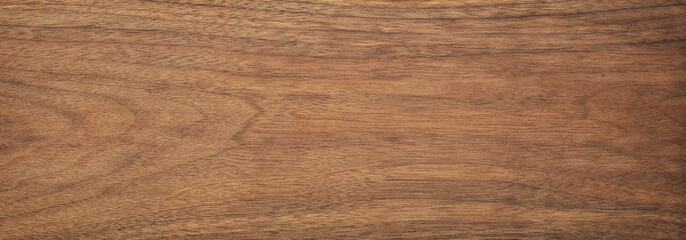 dark wood texture in walnut color. empty surface rustic table background. mahogany template for design