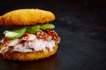 sushi menu with burger made from rice and smoked eel, avocado, light cheese and nori