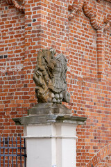 Sculpture above the entrance gate to medieval Ducal Castle (Szczecin Castle), Szczecin, Poland