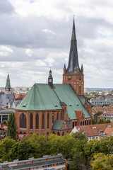 Fototapeta na wymiar Aerial view of Szczecin Cathedral, view of the clock tower, Szczecin, Poland