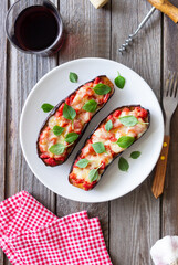 Baked eggplant with cheese mozzarella, tomatoes and basil. Healthy eating. Italian food. Parmigiana di melanzane.