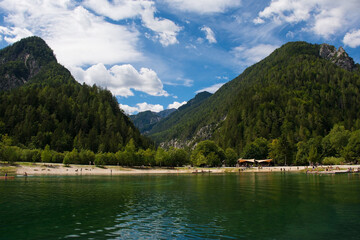 Fototapeta na wymiar Jasna Lake near Kranjska Gora in the Upper Carniola region of north west Slovenia. An artificial lake created for tourism purposes 
