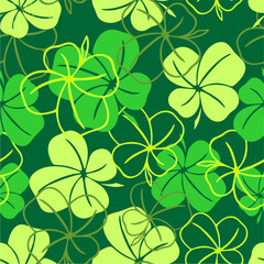 seamless pattern of green contours and silhouettes of a four-leaf clover on a green background, texture design