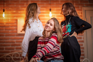 Girlfriends celebrate birthday in a cafe and have fun.