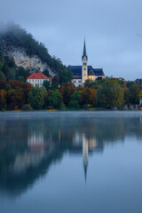 Fototapeta premium Lake Bled, Slovenia at dawn in fog