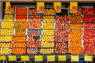 Fresh fruit of various colors and types is sold at a special offer of 99 euro cents