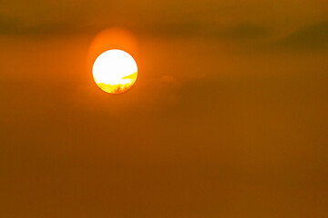 A Sun rising in the sky
