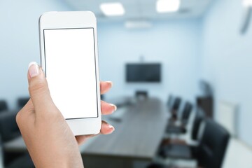 Hand holding modern blank screen smartphone