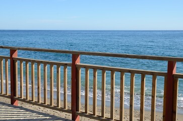 Handrail on litoral path the sea in Marbella, Spain