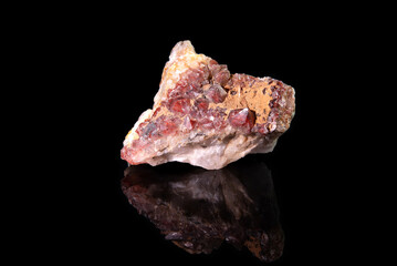 A fragment of the mineral red quartz with reddish crystalline inclusions