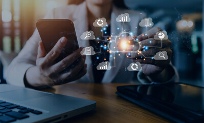 Big data analytics and business intelligence concept with chart and graph icons on a digital screen interface and a businessman in background