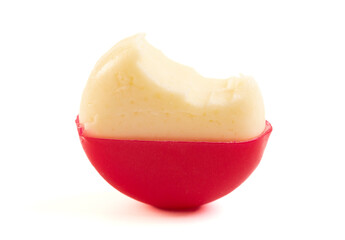 Small Semi-Hard White Cheese in a Red Wax Coating