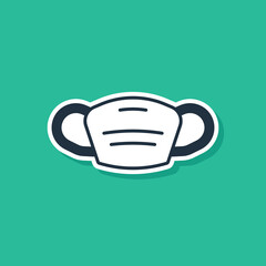 Blue Medical protective mask icon isolated on green background. Vector