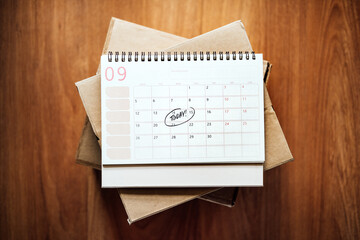 Same Day delivery Ship From Store. Faster Delivery. Many Cardboard boxes and calendar with the date...