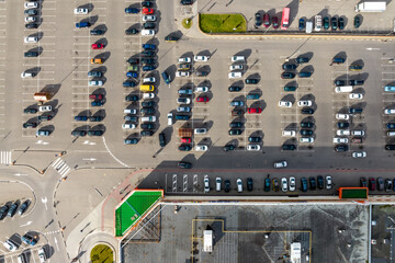 aerial view on large open air parking lot for cars for residents of area
