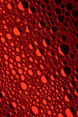 Red abstract, texture background of soap bubbles on water. Background for screen saver, cover, wallpaper. High quality photo