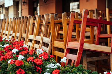 Empty Old fashioned close cafe with overturned chairs on tables. Closed cafe, small business Closure Crisis