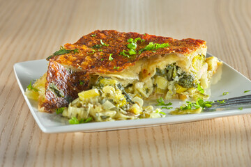 Pie made from broccoli, cheese, cream  and leek