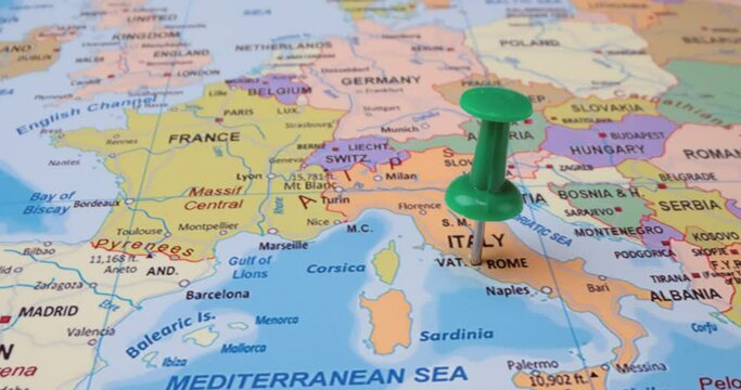 Italy - Travel concept with green pushpin on the world map. The location point on the map points to Rome the capital of the Italy .