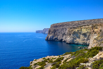 Fototapeta na wymiar Seaside cliff with turquoise blue water