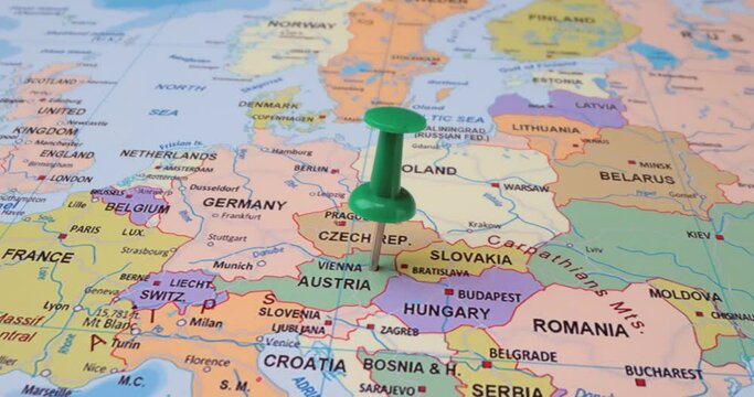 Austria - Travel concept with green pushpin on the world map. The location point on the map points to Vienna, the capital of the Austrian.