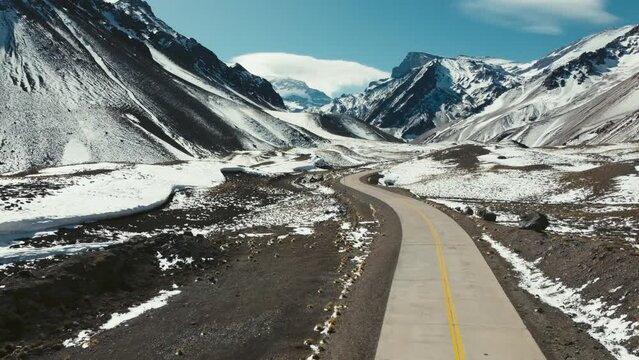 Aerial shot of a road with Aconcagua Mountain in the background