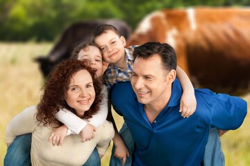 Obraz premium Happy young family have fun outdoor