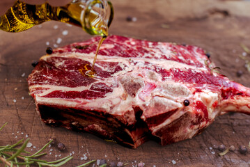 Preparing a Tomahawk steak for grill. 