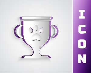 Paper cut Pet award symbol icon isolated on grey background. Medal with dog footprint as pets exhibition winner concept. Paper art style. Vector