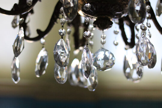 Beautiful image of light shining through blurred glass chandelier pendants