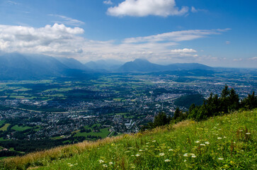 Fototapeta na wymiar Beautiful scenic summer view of the city and country houses from the Gaisbergspitze observation deck in Salzburg, Austria