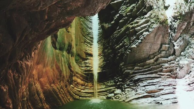 beautiful waterfall in a mountain gorge
