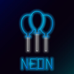 Glowing neon line Balloons with ribbon icon isolated on black background. Colorful outline concept. Vector