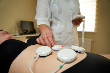 Myostimulation. Abdomen lifting. Microcurrent therapy. Portable Myostimulation Face And Body. Whole body electro myostimulation. Miostimulation is fitness without a gym.