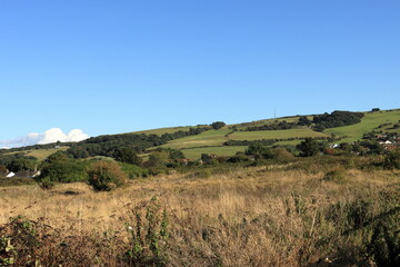 A view scenic view of a  lush green hillside overlooking Prestatyn wales