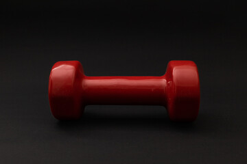Little red weights on a black background