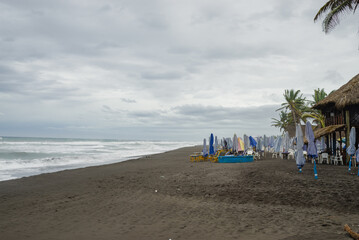 Sunset on the beach with cloudy sky. Mexican Pacific coast.