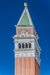 Fototapeta na wymiar St. Mark's Clocktower. The Saint Mark's Basilica is the cathedral of Venice, in Italo-Byzantine architecture, symbol of Venetian wealth and power, since 11th century it known as Church of Gold. 2019