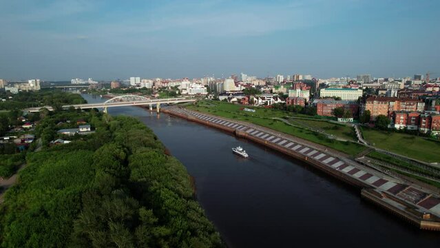 Tumen, Russia - July 25 2022: Beautiful embankment and bridge