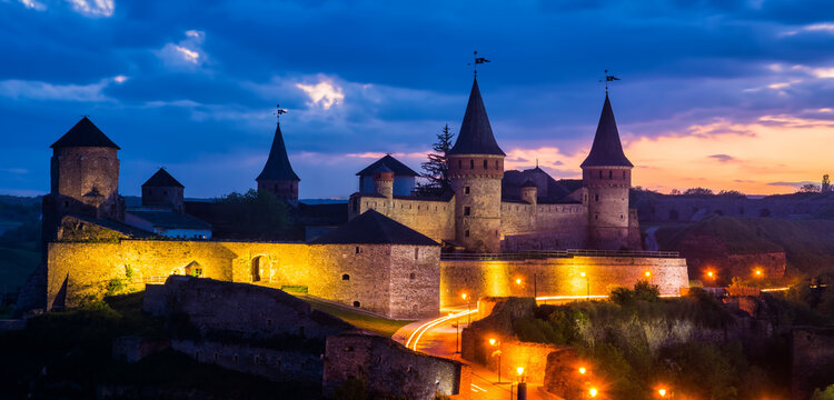 Amazing evening view of the medieval castle fortress in Kamianets-Podilskyi, Ukraine.